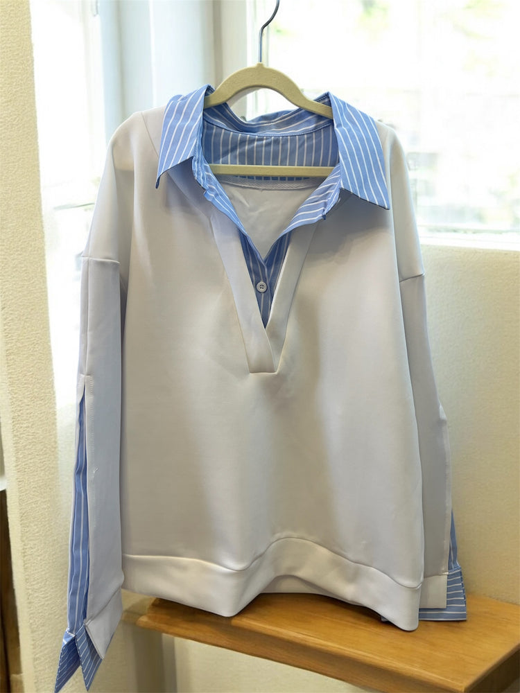 Бяла блуза със синя яка